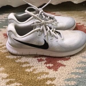 gently used light gray running shoes